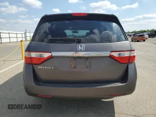 2011 Honda Odyssey EX-L with VIN 5FNRL5H61BB056652, listed as a Copart auction lot 54774015 with 233,125 mi miles and Salvage Title. Bid and sale history available at DreamBid. Image 6.