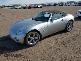 2007 Pontiac Solstice z VIN 1G2MB35B57Y111621, wystawiony jako IAAI lot #41332760 z przebiegiem 49 784 mil mil oraz . Historia ofert i sprzedaży dostępna na DreamBid. Obrazek 17.
