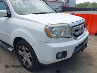2009 Honda Pilot EX-L with VIN 5FNYF48569B040770, listed as a IAAI auction lot 42178358 with 230,826 mi miles. Bid and sale history available at carsss.com. Image 6.