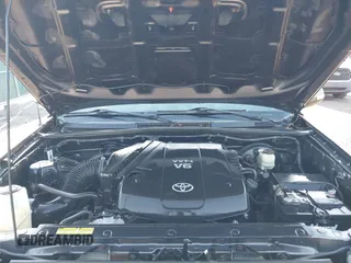 2014 Toyota Tacoma PreRunner with VIN 5TFJU4GN0EX057850, listed as a IAAI auction lot 41656053 with 170,269 mi miles. Bid and sale history available at carsss.com. Image 10.