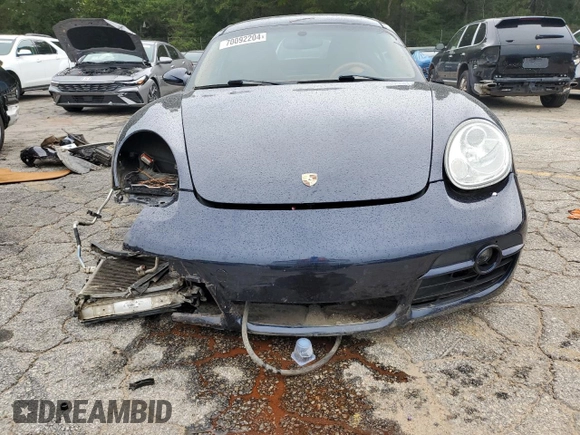 2006 Porsche Cayman S с VIN WP0AB298X6U781940, выставлен на аукционе Copart как лот 70092204 с пробегом 116 506 миль миль и Списание • Salvage title. История ставок и продаж доступна на DreamBid. Изображение 5.