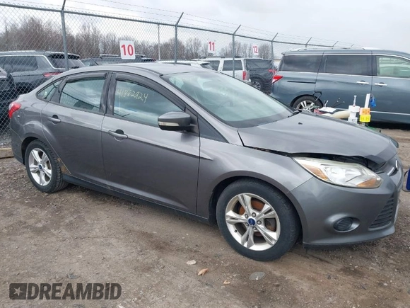 2014 Ford Focus SE with VIN 1FADP3F21EL193164, listed as a IAAI auction lot 41882924 with 122,469 mi miles. Bid and sale history available at carsss.com. Image 1.