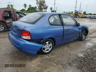 2001 Hyundai Accent z VIN KMHCF35G11U112976, wystawiony jako Copart lot #68692384 z przebiegiem 152 797 mil mil oraz Szkoda całkowita • Salvage title. Historia ofert i sprzedaży dostępna na DreamBid. Obrazek 3.