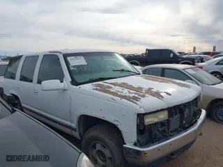 1997 Chevrolet Tahoe with VIN 1GNEK13RXVJ389741, listed as a IAAI auction lot 41518277 with 124,870 mi miles. Bid and sale history available at carsss.com. Image 1.