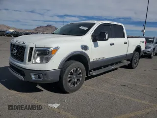 2018 Nissan Titan XD PRO-4X with VIN 1N6BA1F49JN548294, listed as a Copart auction lot 77817314 with 82,481 mi miles and Salvage Title. Bid and sale history available at carsss.com. Image 1.