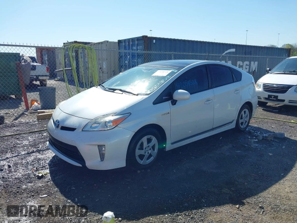 2012 Toyota Prius One with VIN JTDKN3DUXC1568215, listed as a IAAI auction lot 42058528 with 121,488 mi miles and . Bid and sale history available at DreamBid. Image 2.