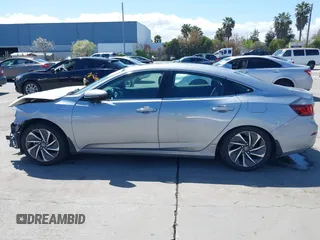 2019 Honda Insight Touring with VIN 19XZE4F93KE007489, listed as a IAAI auction lot 41943334 with 118,689 mi miles and . Bid and sale history available at DreamBid. Image 15.