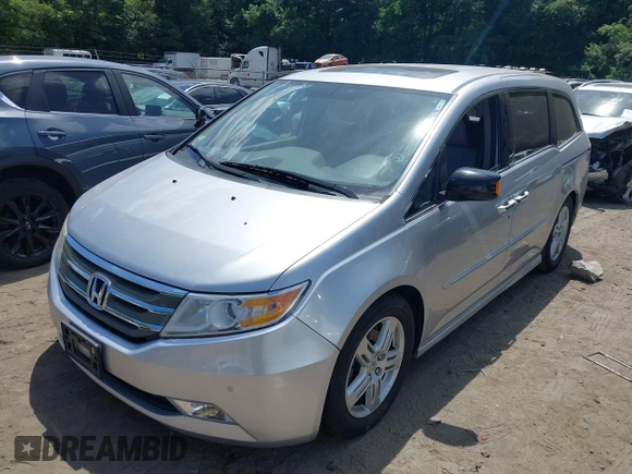 2012 Honda Odyssey Touring with VIN 5FNRL5H9XCB026741, listed as a IAAI auction lot 42808245 with 293,422 mi miles and . Bid and sale history available at DreamBid. Image 2.