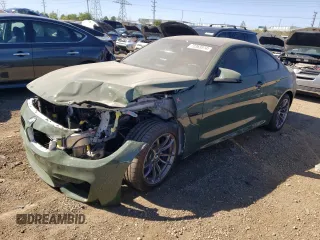 2015 BMW M4 with VIN WBS3R9C56FK333498, listed as a Copart auction lot 72363514 with 11,065 mi miles and Salvage Title. Bid and sale history available at carsss.com. Image 1.