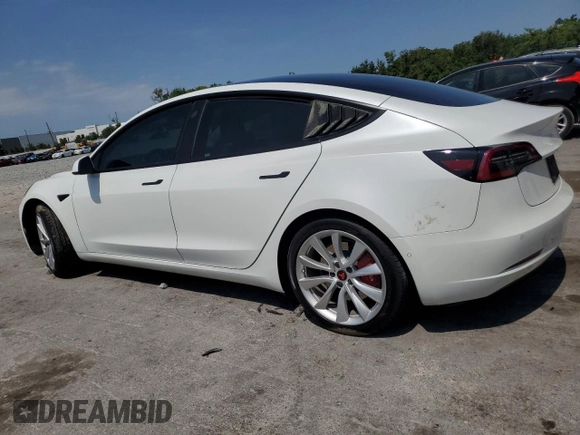 2021 Tesla Model 3 Long Range z VIN 5YJ3E1EB7MF093184, wystawiony jako Copart lot #58060385 z przebiegiem 51 678 mil mil oraz Nie do naprawy • Non repairable. Historia ofert i sprzedaży dostępna na DreamBid. Obrazek 2.