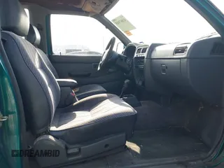 1997 Nissan Frontier XE z VIN 1N6SD16SXVC330579, wystawiony jako IAAI lot #41867843 z przebiegiem 135 434 mil mil oraz . Historia ofert i sprzedaży dostępna na DreamBid. Obrazek 5.