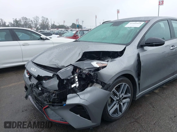2023 Kia Forte GT-Line z VIN 3KPF54AD8PE602683, wystawiony jako IAAI lot #41444418 z przebiegiem 52 229 mil mil oraz . Historia ofert i sprzedaży dostępna na DreamBid. Obrazek 6.