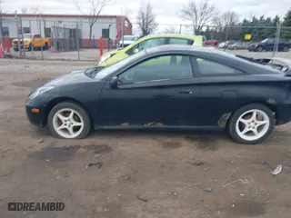 2000 Toyota Celica GT with VIN JTDDR32T7Y0006809, listed as a IAAI auction lot 41860933 with 262,014 mi miles. Bid and sale history available at carsss.com. Image 14.