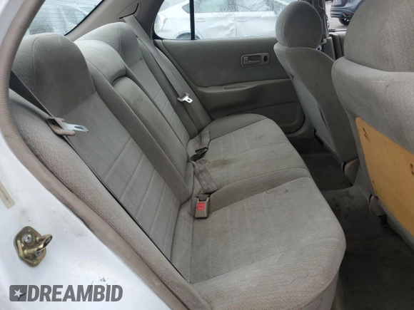 1997 Nissan Altima XE with VIN 1N4BU31D4VC232757, listed as a Copart auction lot 79102784 with 211,466 mi miles and Salvage Title. Bid and sale history available at carsss.com. Image 10.
