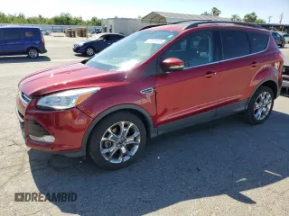 2013 Ford Escape SEL z VIN 1FMCU9HX2DUA59567, wystawiony jako Copart lot #60935615 z przebiegiem 108 255 mil mil oraz Czysty tytuł • Clean title. Historia ofert i sprzedaży dostępna na DreamBid. Obrazek 1.
