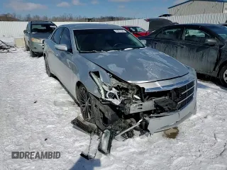 2014 Cadillac CTS AWD z VIN 1G6AW5SX2E0156853, wystawiony jako Copart lot #45991835 z przebiegiem 99 702 mil mil oraz Szkoda całkowita • Salvage title. Historia ofert i sprzedaży dostępna na DreamBid. Obrazek 13.