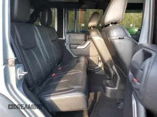 2015 Jeep Wrangler Unlimited Rubicon Hard Rock with VIN 1C4HJWFGXFL671660, listed as a Copart auction lot 82329074 with 214,579 mi miles and Salvage title. Bid and sale history available at DreamBid. Image 11.