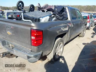 2015 Chevrolet Silverado 1500 LT with VIN 3GCPCREC3FG292888, listed as a IAAI auction lot 41416740 with 123,000 mi miles. Bid and sale history available at carsss.com. Image 4.