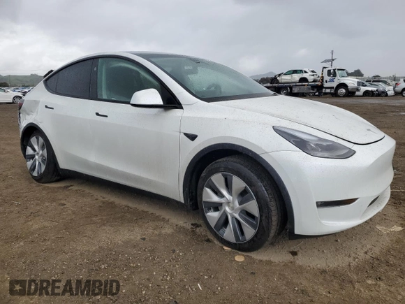 2024 Tesla Model Y Long Range z VIN 7SAYGDEE5RF075756, wystawiony jako Copart lot #48819465 z przebiegiem 10 457 mil mil oraz Szkoda całkowita • Salvage title. Historia ofert i sprzedaży dostępna na DreamBid. Obrazek 4.