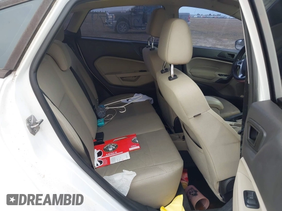 2017 Ford Fiesta SE with VIN 3FADP4BJXHM167605, listed as a IAAI auction lot 40510179 with 76,091 mi miles and . Bid and sale history available at DreamBid. Image 8.