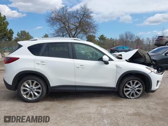 2014 Mazda CX-5 Grand Touring with VIN JM3KE4DY8E0397330, listed as a IAAI auction lot 41868116 with 180,891 mi miles. Bid and sale history available at carsss.com. Image 13.