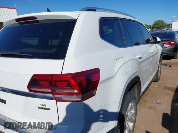 2018 Volkswagen Atlas SEL z VIN 1V2MR2CA3JC536009, wystawiony jako IAAI lot #40205798 z przebiegiem 125 945 mil mil oraz . Historia ofert i sprzedaży dostępna na DreamBid. Obrazek 14.
