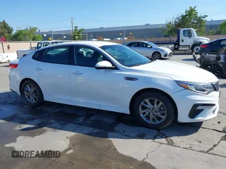 2019 Kia Optima LX with VIN 5XXGT4L33KG324175, listed as a IAAI auction lot 42139795 with 105,273 mi miles. Bid and sale history available at carsss.com. Image 1.