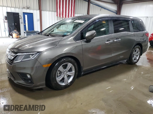 2018 Honda Odyssey EX-L z VIN 5FNRL6H77JB013494, wystawiony jako Copart lot #56348745 z przebiegiem 21 368 mil mil oraz Szkoda całkowita • Salvage title. Historia ofert i sprzedaży dostępna na DreamBid. Obrazek 1.