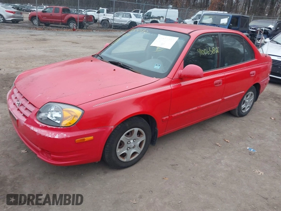 2005 Hyundai Accent GLS with VIN KMHCG45CX5U614083, listed as a IAAI auction lot 41006582 with 72,516 mi miles. Bid and sale history available at carsss.com. Image 17.