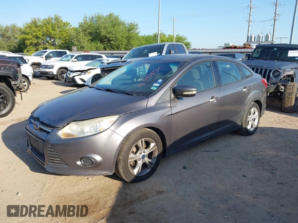 2013 Ford Focus SE with VIN 1FADP3F20DL325958, listed as a IAAI auction lot 41997500 with 195,793 mi miles. Bid and sale history available at carsss.com. Image 2.
