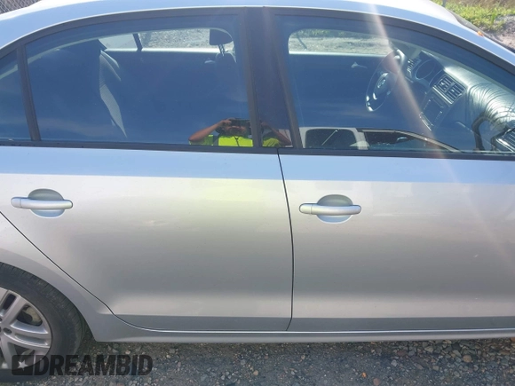 2015 Volkswagen Jetta S with VIN 3VW2K7AJ5FM251943, listed as a IAAI auction lot 42482891 with 74,649 mi miles and . Bid and sale history available at DreamBid. Image 13.