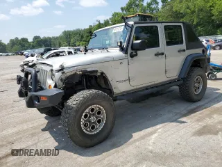 2007 Jeep Wrangler Unlimited X z VIN 1J4GA39197L171034, wystawiony jako Copart lot #65761215 z przebiegiem 93 436 mil mil oraz Szkoda całkowita • Salvage title. Historia ofert i sprzedaży dostępna na DreamBid. Obrazek 1.