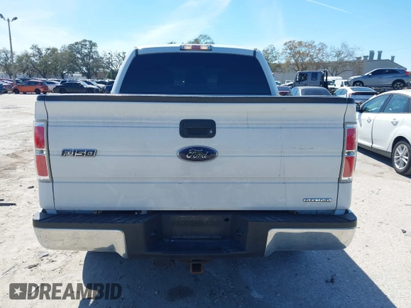 2012 Ford F-150 XL with VIN 1FTEW1CM2CFC06897, listed as a IAAI auction lot 41641309 with 123,853 mi miles. Bid and sale history available at carsss.com. Image 16.
