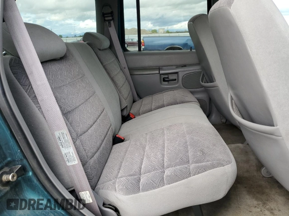 1998 Ford Explorer XL z VIN 1FMZU34E1WUA53077, wystawiony jako Copart lot #51517095 z przebiegiem 216 797 mil mil oraz Czysty tytuł • Clean title. Historia ofert i sprzedaży dostępna na DreamBid. Obrazek 11.