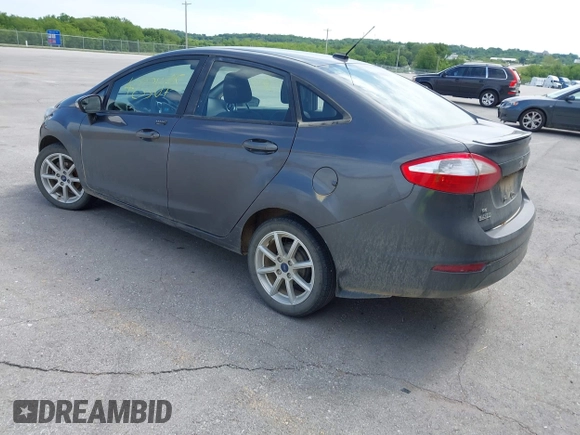2017 Ford Fiesta SE z VIN 3FADP4BJ2HM134825, wystawiony jako IAAI lot #42331095 z przebiegiem 117 794 mil mil oraz . Historia ofert i sprzedaży dostępna na DreamBid. Obrazek 3.