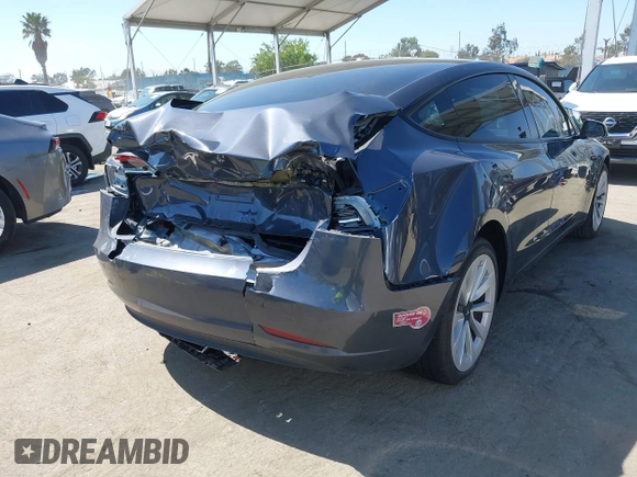 2023 Tesla Model 3 with VIN 5YJ3E1EA7PF673322, listed as a IAAI auction lot 42226767 with 18,367 mi miles and . Bid and sale history available at DreamBid. Image 4.