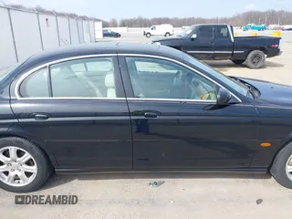 2003 Jaguar S-Type with VIN SAJEA01T93FM64497, listed as a IAAI auction lot 41804705 with 224,978 mi miles and . Bid and sale history available at DreamBid. Image 13.