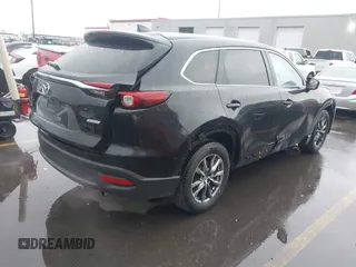 2016 Mazda CX-9 Touring with VIN JM3TCBCY5G0101490, listed as a IAAI auction lot 42062846 with 85,352 mi miles and . Bid and sale history available at DreamBid. Image 4.