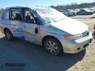 2004 Honda Odyssey EX-L with VIN 5FNRL18924B107971, listed as a IAAI auction lot 41699067 with Not Provided miles and . Bid and sale history available at DreamBid. Image 1.