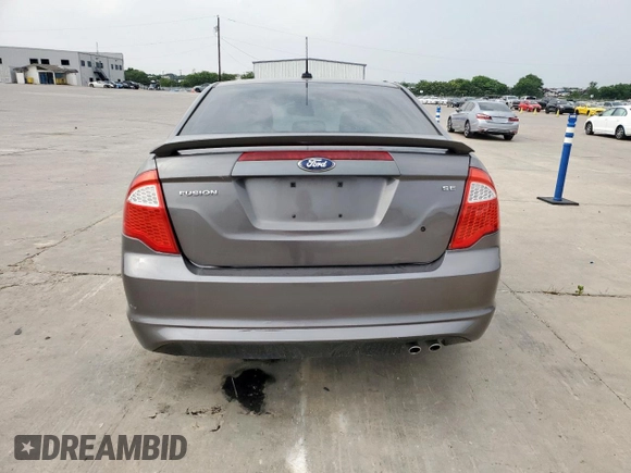 2012 Ford Fusion SE z VIN 3FAHP0HAXCR436084, wystawiony jako Copart lot #57390385 z przebiegiem 88 645 mil mil oraz Szkoda całkowita • Salvage title. Historia ofert i sprzedaży dostępna na DreamBid. Obrazek 6.