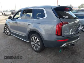 2022 Kia Telluride S with VIN 5XYP6DHC4NG205678, listed as a IAAI auction lot 42012713 with 56,783 mi miles and . Bid and sale history available at DreamBid. Image 3.