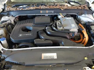 2020 Ford Fusion Hybrid SE with VIN 3FA6P0LU7LR173500, listed as a IAAI auction lot 41368311 with 105,202 mi miles. Bid and sale history available at carsss.com. Image 10.