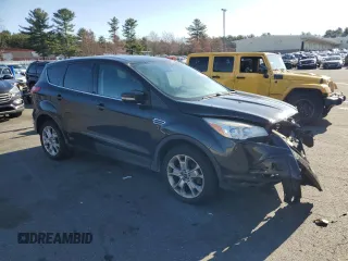 2013 Ford Escape SEL with VIN 1FMCU9HX4DUB98180, listed as a Copart auction lot 53693505 with 194,722 mi miles and Salvage Title. Bid and sale history available at carsss.com. Image 4.