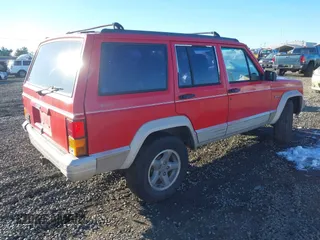 1996 Jeep Cherokee Country with VIN 1J4FJ78S1TL245327, listed as a IAAI auction lot 41443781 with 245,889 mi miles. Bid and sale history available at carsss.com. Image 4.