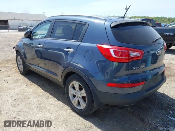 2013 Kia Sportage LX with VIN KNDPB3A27D7395592, listed as a IAAI auction lot 42102273 with 87,991 mi miles and . Bid and sale history available at DreamBid. Image 3.