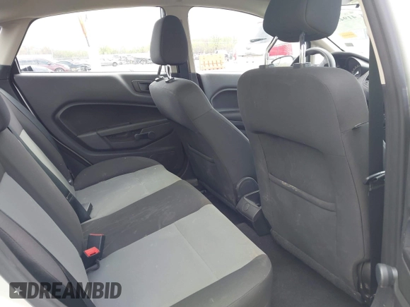 2017 Ford Fiesta S z VIN 3FADP4AJ1HM104006, wystawiony jako IAAI lot #41943413 z przebiegiem 111 873 mil mil oraz . Historia ofert i sprzedaży dostępna na DreamBid. Obrazek 8.