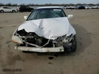 1999 Honda Accord Sdn LX with VIN 1HGCG1648XA028305, listed as a Copart auction lot 87960635 with 448,507 mi miles and Salvage Title. Bid and sale history available at carsss.com. Image 11.