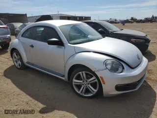 2012 Volkswagen Beetle Entry PZEV with VIN 3VWFP7AT0CM622085, listed as a Copart auction lot 71482014 with 112,923 mi miles and Salvage Title. Bid and sale history available at carsss.com. Image 4.