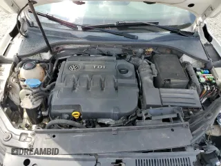 2015 Volkswagen Passat SE z VIN 1VWBV7A39FC010655, wystawiony jako Copart lot #59457165 z przebiegiem 270 971 mil mil oraz Szkoda całkowita • Salvage title. Historia ofert i sprzedaży dostępna na DreamBid. Obrazek 11.