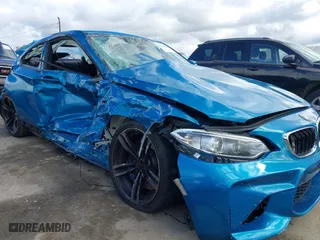 2017 BMW M2 with VIN WBS1H9C53HV887089, listed as a IAAI auction lot 41731841 with 57,509 mi miles. Bid and sale history available at carsss.com. Image 6.